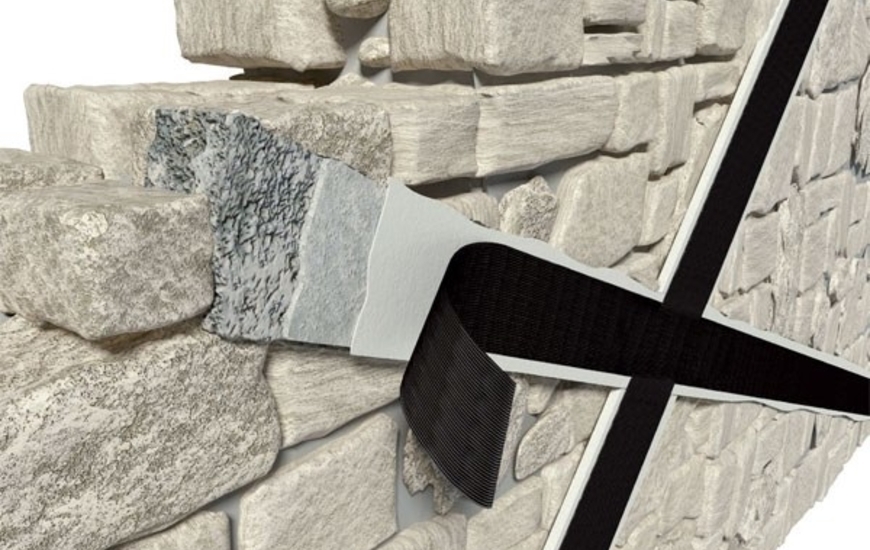 Materiale composito per rinforzo strutturale